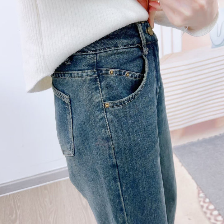 Dame brede high-waist jeans med elegant snit og minimalistiske detaljer Stilla