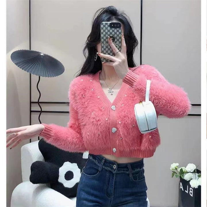 Kvinders fluffy cardigan med glitrende detaljer og moderne snit Stilla