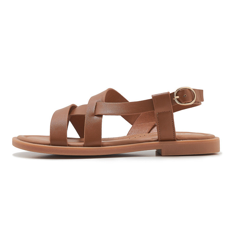 Dame sandaler med elegant krydsrem og justerbar hælrem Stilla