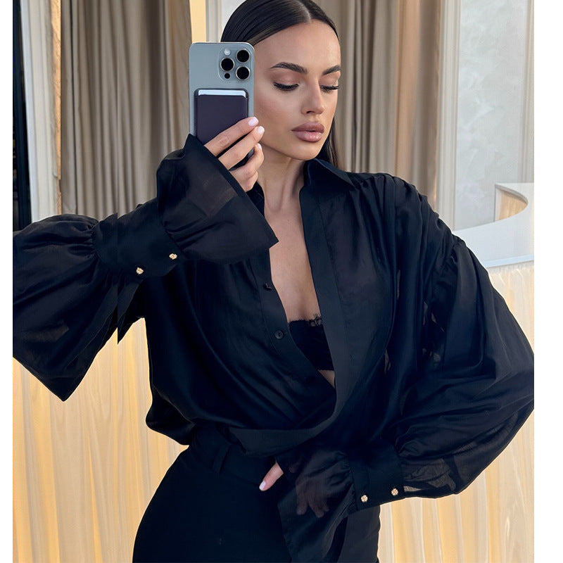 Damebluse med voluminøse ærmer og elegant snit Stilla