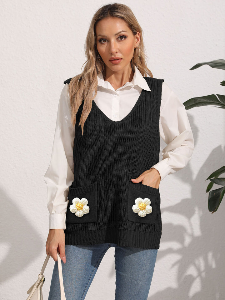 Dame strikvest med lommer og florale applikationer Stilla