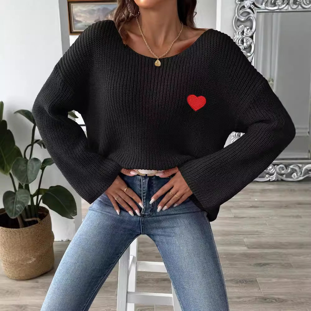 Dame hyggelig strikpullover med vid arm og hjerteformet applikation Stilla