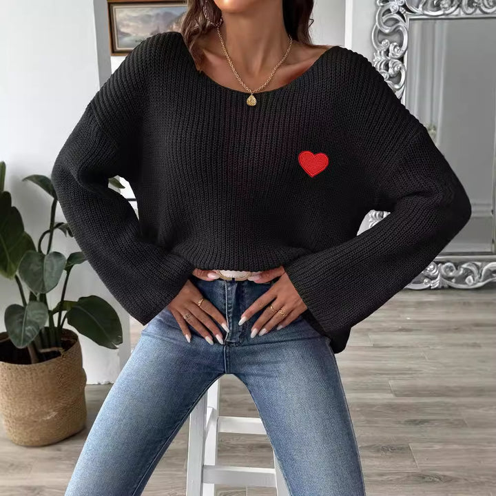Dame hyggelig strikpullover med vid arm og hjerteformet applikation Stilla