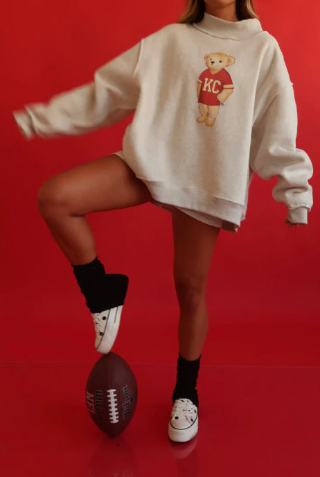 Damers oversized sweatshirt med et sødt bjørnemotiv Stilla