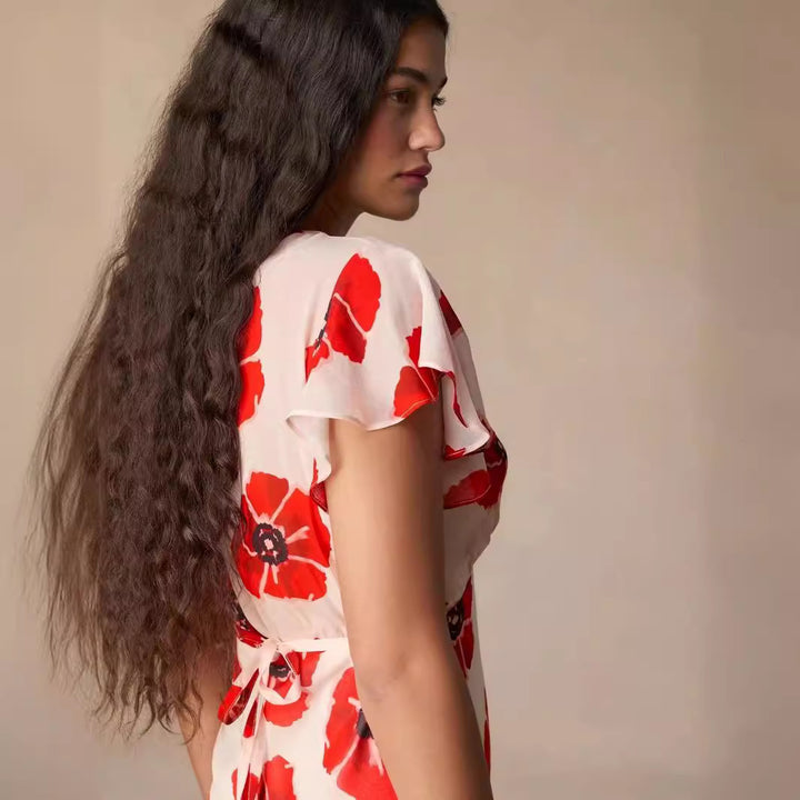 Dame maxikjole med floral design og elegant V-udskæring Stilla