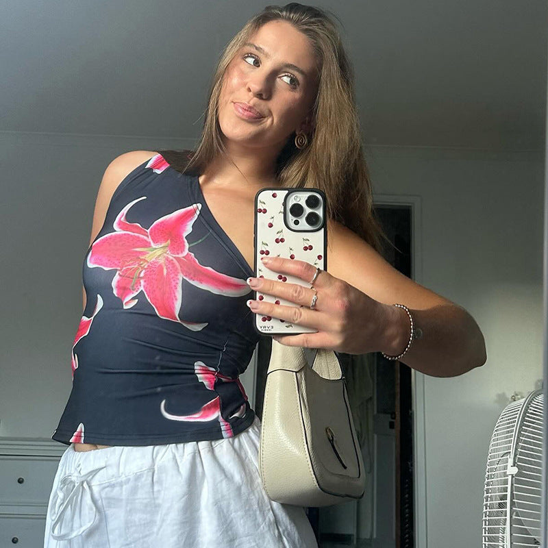 Dame asymmetrisk top med blomstertryk Skovae