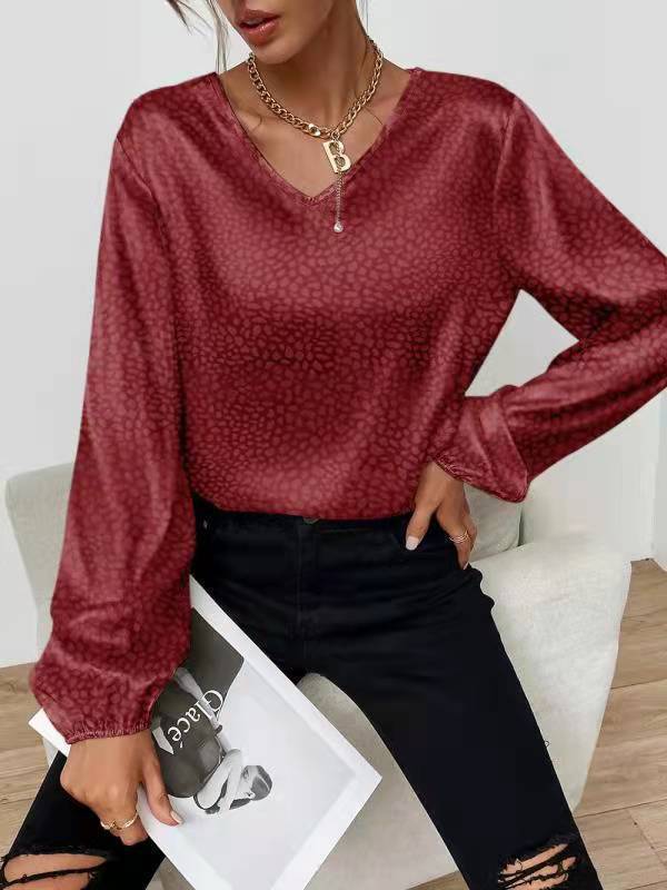 Kvinders elegante bluse top med V-hals og voluminøse ærmer Stilla