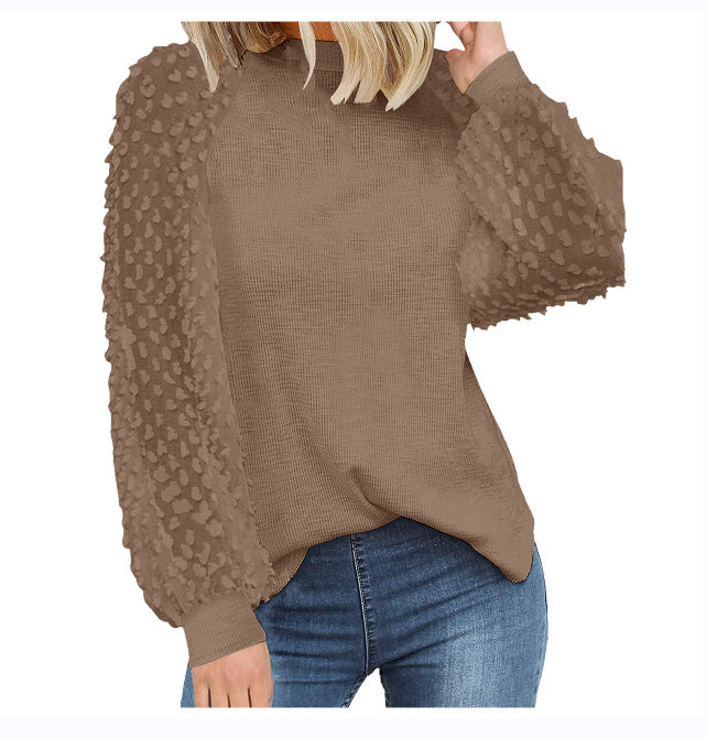 Dame strikpullover med transparente pufærmer Stilla