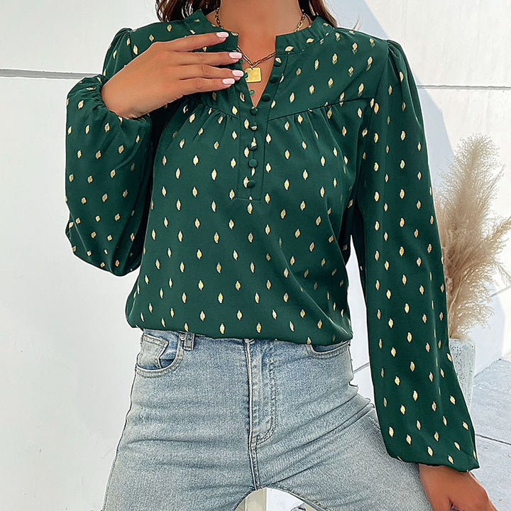 Damebluse med fint print og knapdetaljer Stilla