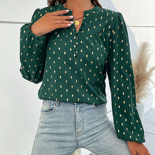 Damebluse med fint print og knapdetaljer Stilla