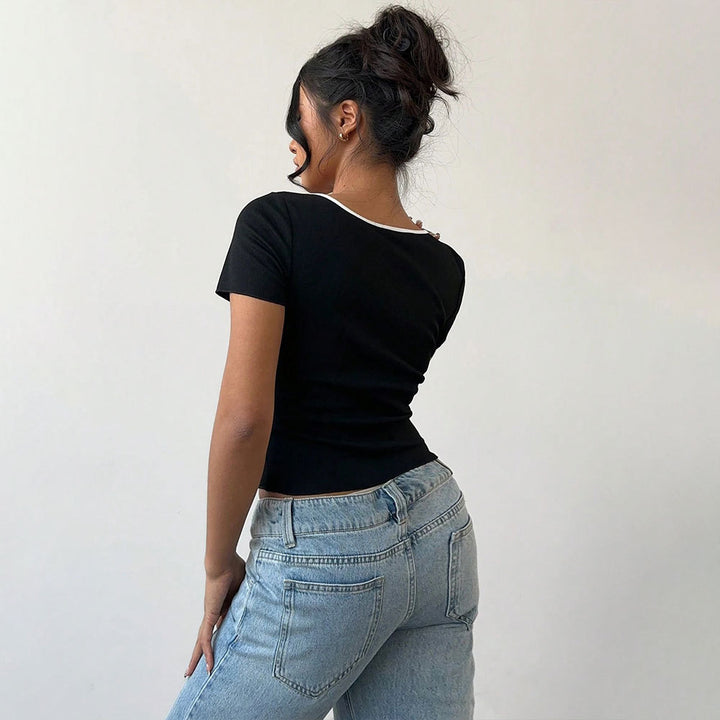 Kvinder cropped top med dekorative sommerfugleknapper og moderne V-hals Stilla
