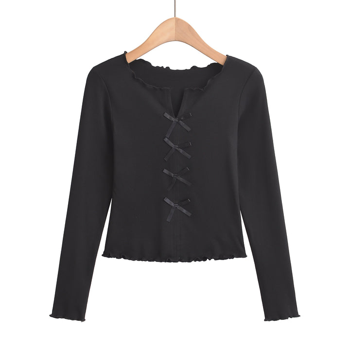 Dame elegant top med floral skæring og fine sløjfedetaljer Stilla