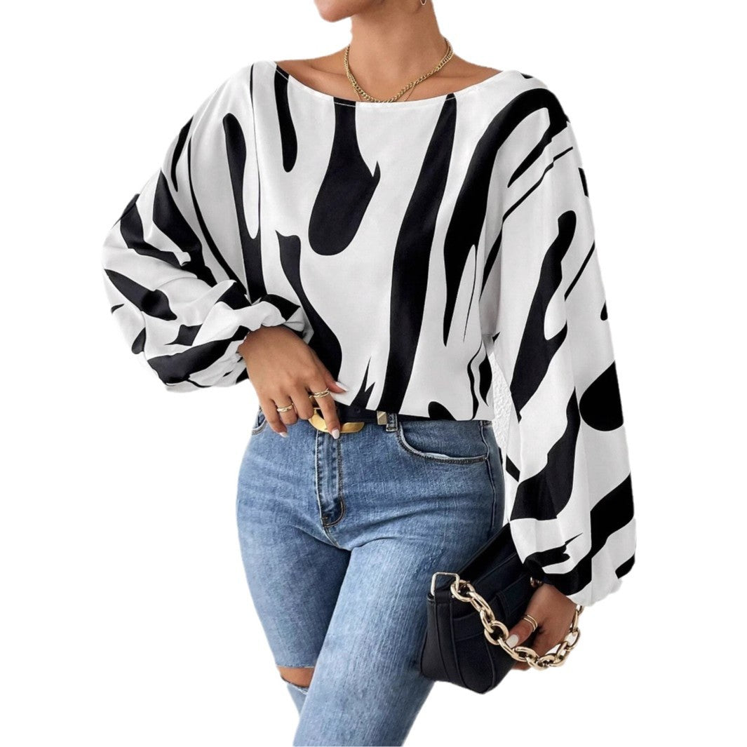 Damebluse med bred pasform og unikt grafikdesign Stilla
