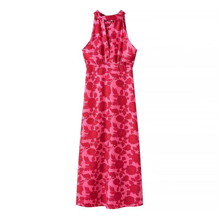 Dame maxikjole med floral trykdesign og elegant split Stilla
