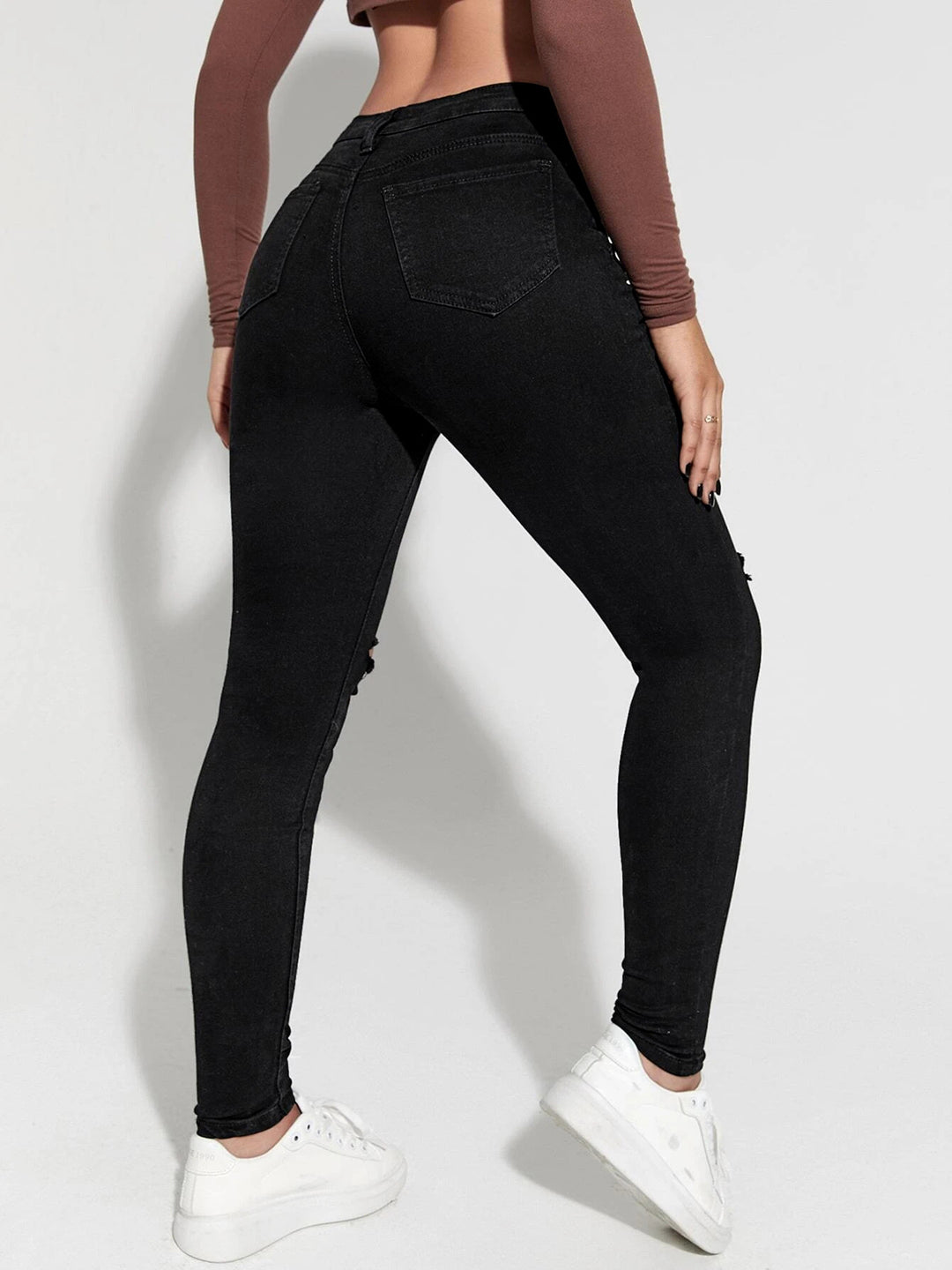Damer High-Waist Jeans med fashionable riftdetaljer og knaplukning Stilla