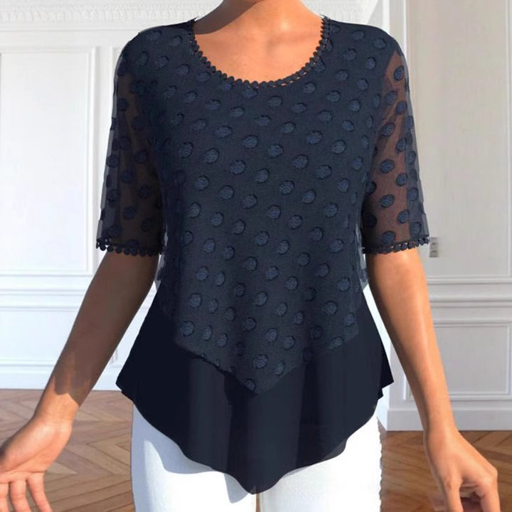 Damebluse med elegante strukturerede detaljer og modeindsats Stilla