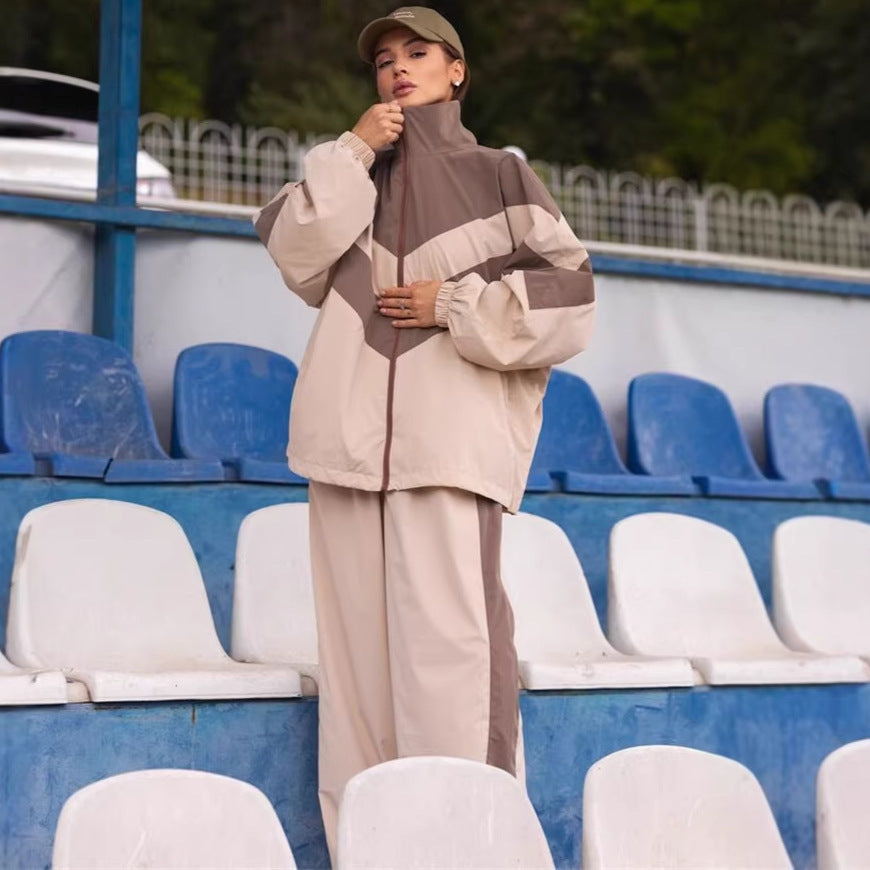 Kvindernes sporty windbreaker sæt med høj krave og trendy farveafstninger Skovae