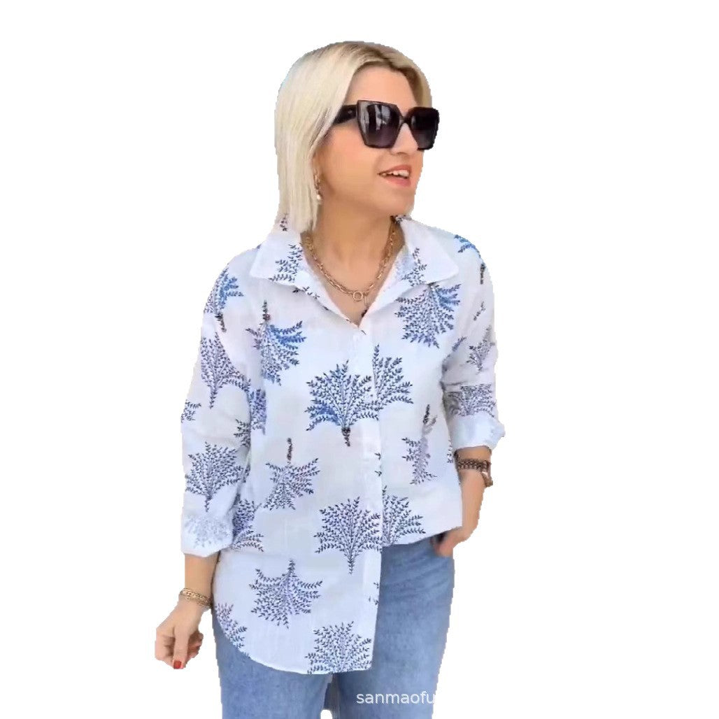 Dame luftig bluse med blomsterdesign og forlænget ryg Stilla