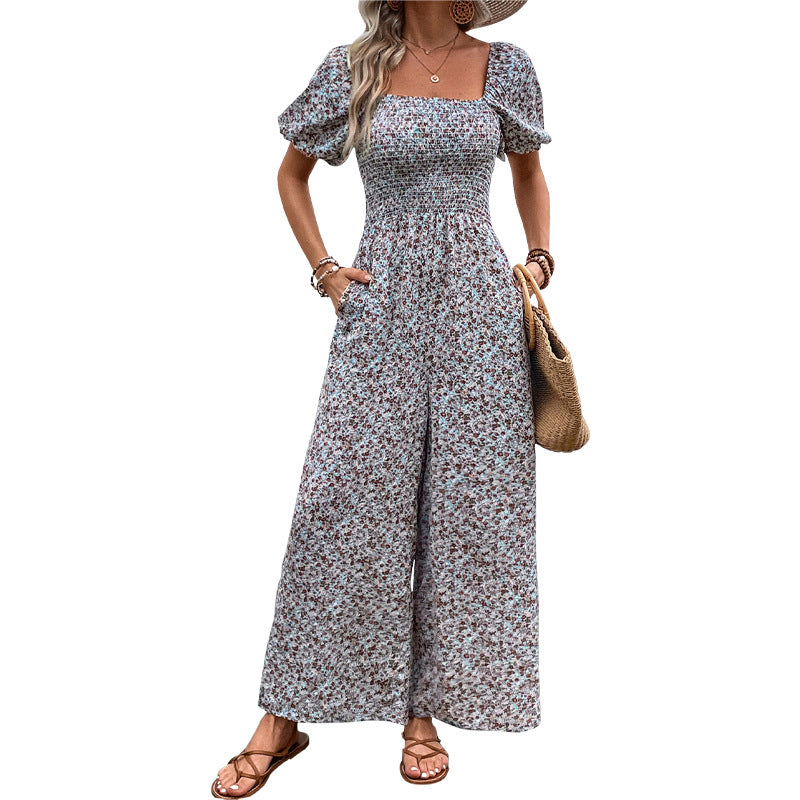 Dame farverig blomster sommer overall med puffærmer Stilla