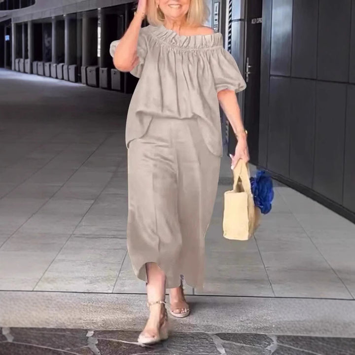 Dame luftig jumpsuit-sæt med voluminøse ærmer og raffineret taljering Stilla