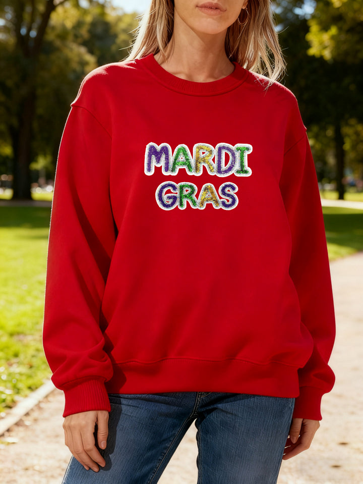 Women's sweatshirt with vibrant Mardi Gras lettering Stilla