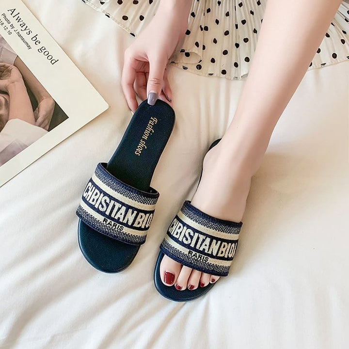 Dame slide-sandaler med blødt fodseng og elegant skrifttype Stilla