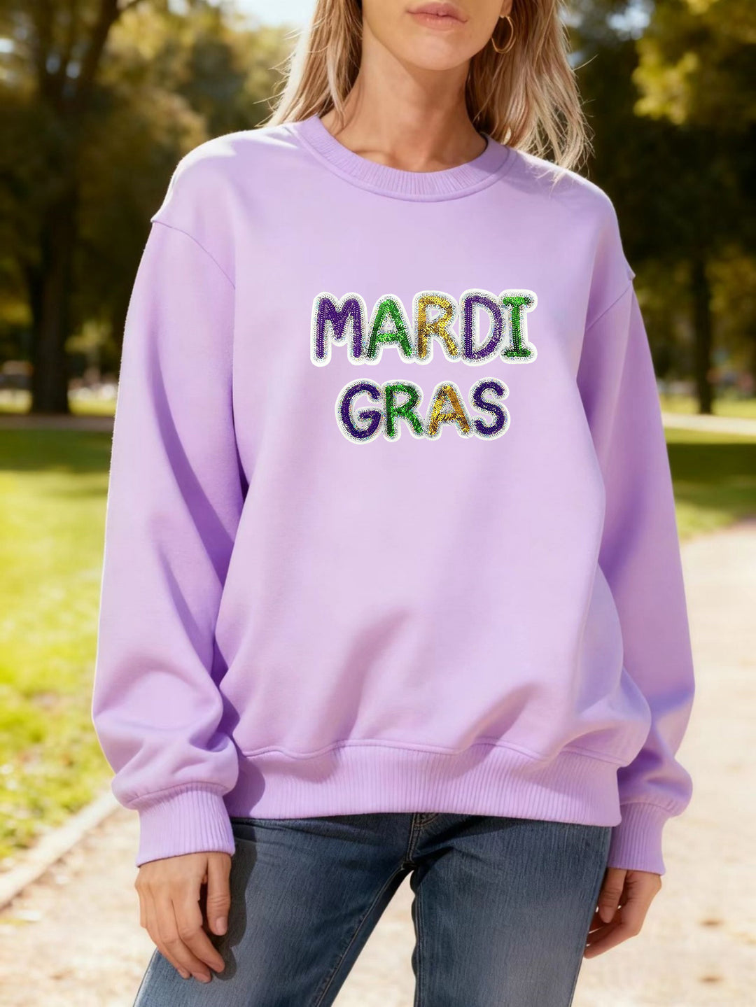 Women's sweatshirt with vibrant Mardi Gras lettering Stilla