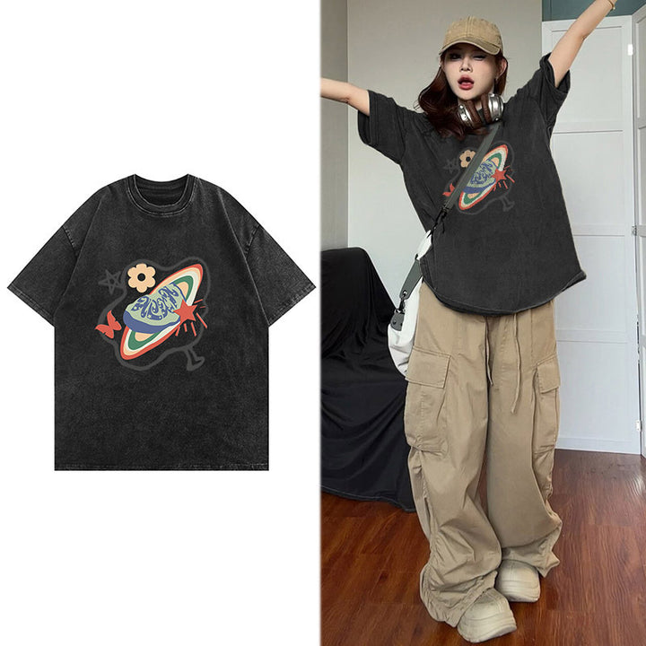 Dame T-shirt med kreativt planetmotiv og afslappet snit Stilla