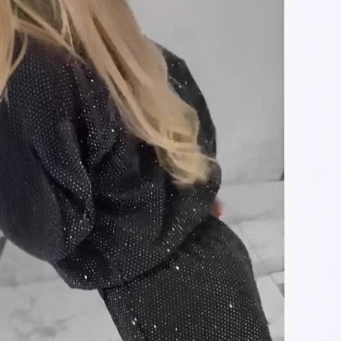 Kvinders glitrende sportssæt med løs pasform og elastisk talje Stilla