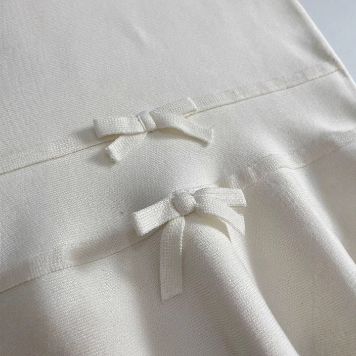 Femme Peplum Top med justerbar bindedetalje Stilla