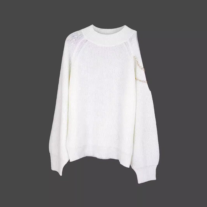 Dame moderigtig sweater med skulderdetaljer og kædeaccentuer Stilla