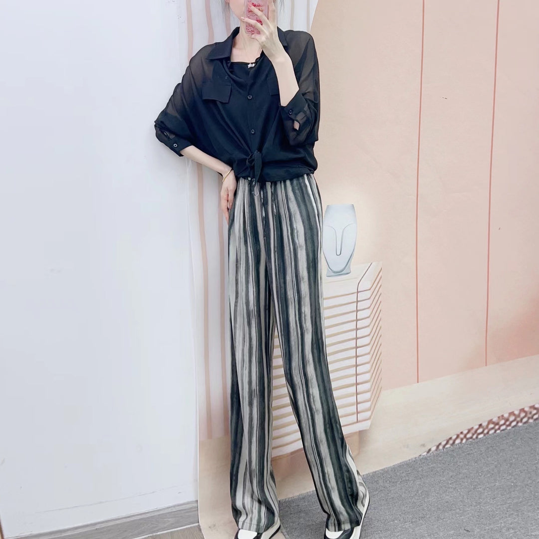 Damer Legesyg Chiffonbluse med gennemsigtige ærmer og elegant indpakningslook Stilla