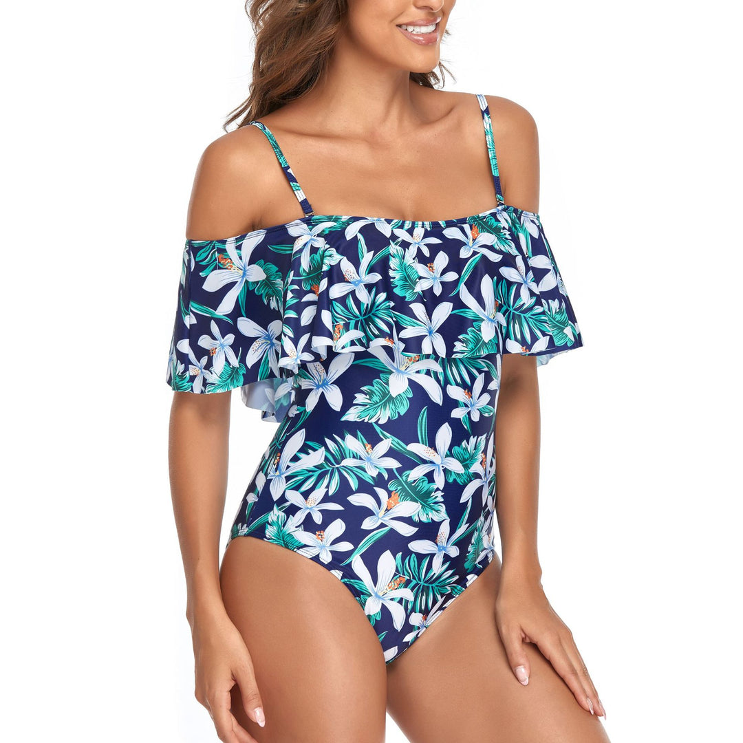 Dame én-delt badedragt med voluminøst flæse-design og trendy floral-print Stilla