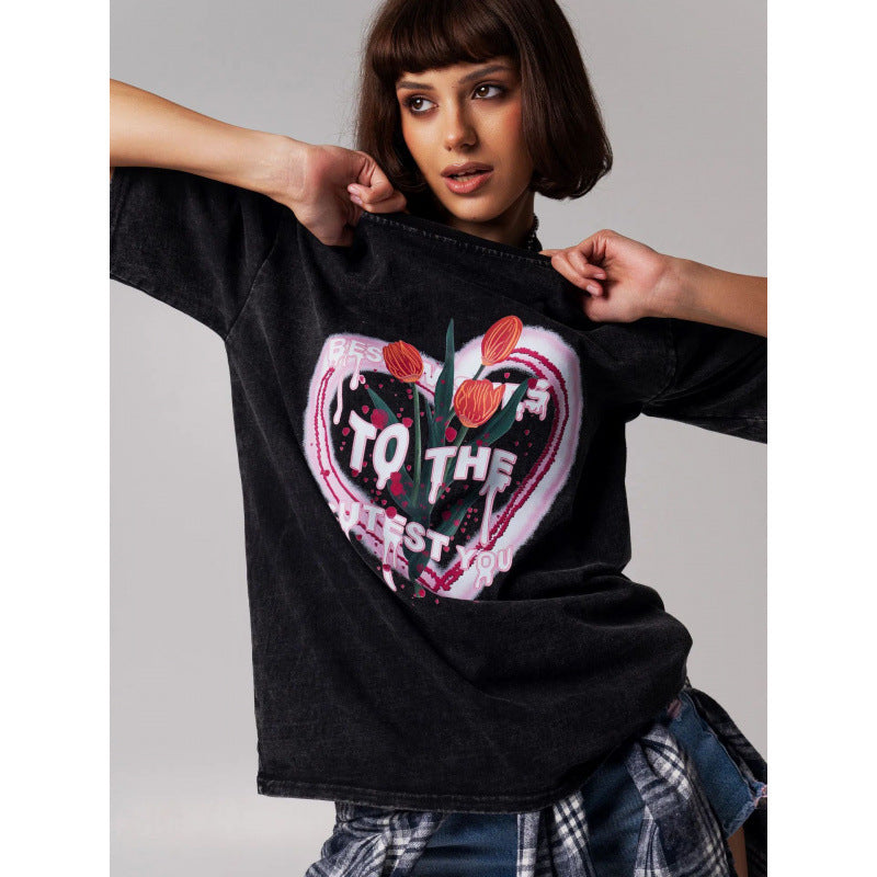 Dame afslappet T-shirt med grafisk hjerte-design og oversized snit Stilla