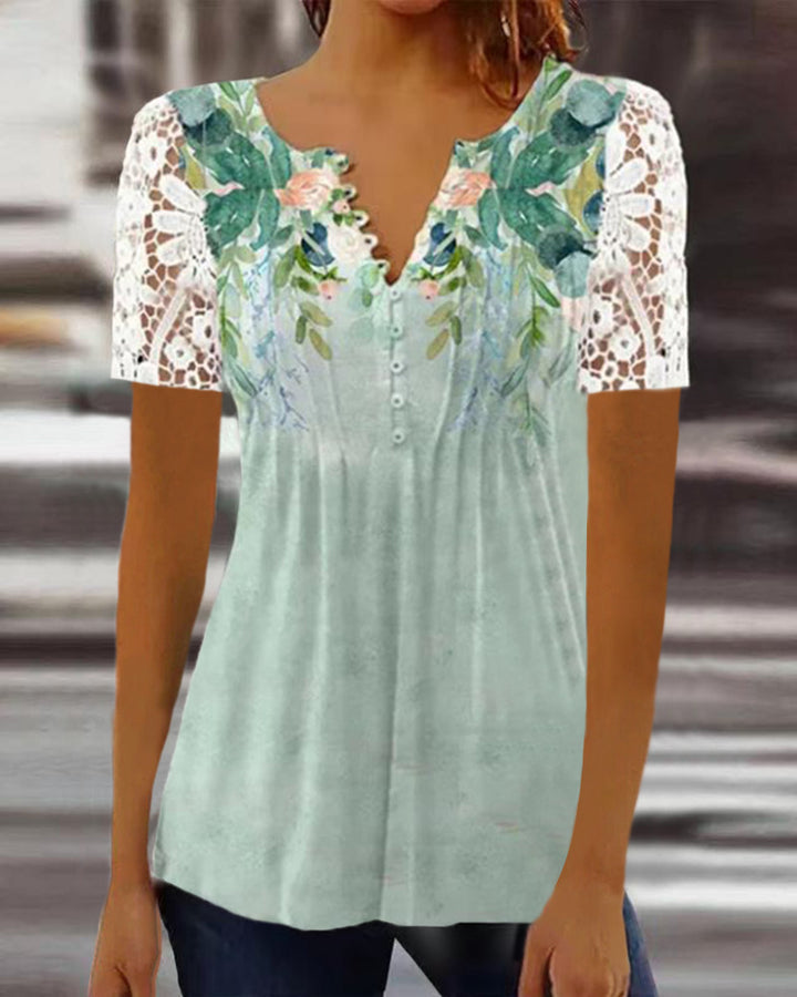 Damebluse med spidse ærmer og blomsterdesign Stilla