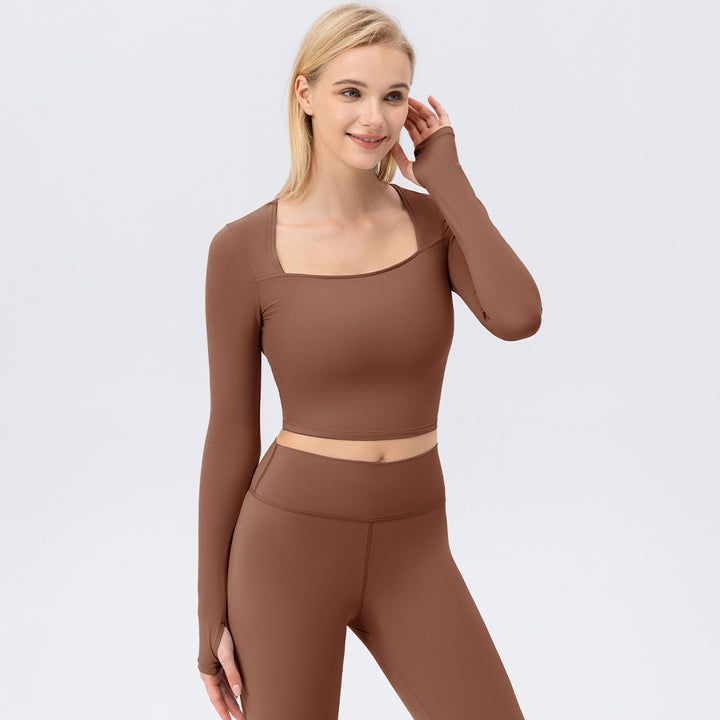 Damer Sporty Langærmet Crop-Top i åndbart materiale med figursyet snit Stilla