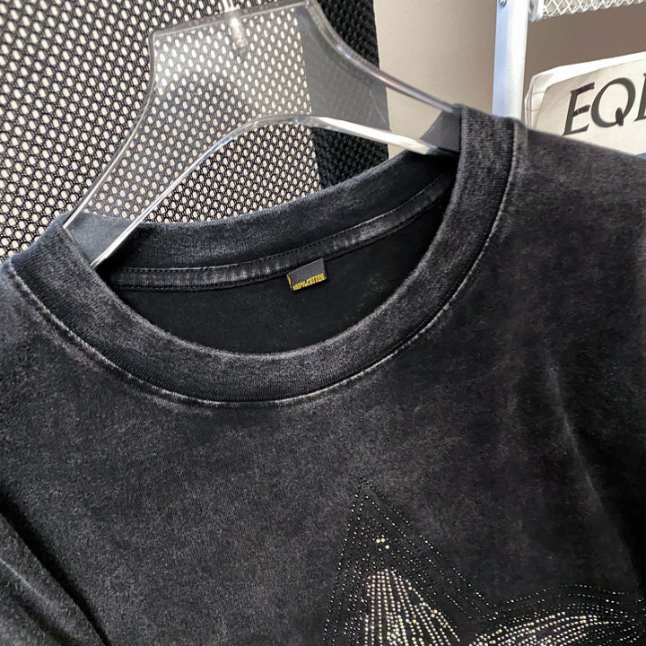 Dame T-shirt med funklende stjernemotiv og afslappet pasform Stilla
