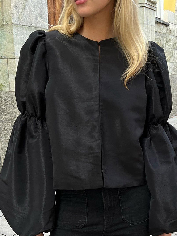 Damebluse med voluminøse puffærmer Stilla