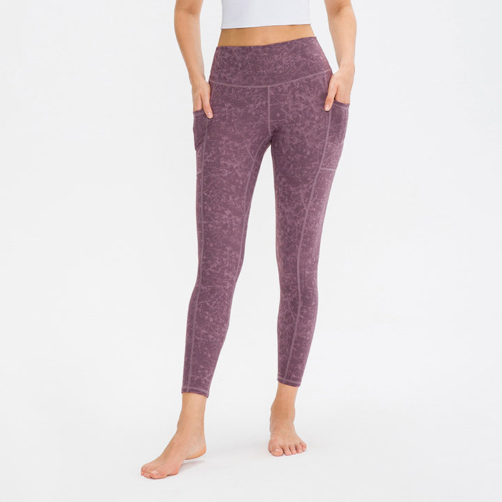 Dame Kvalitets Performance-Leggings med praktiske sidelommer og elastisk talje Stilla