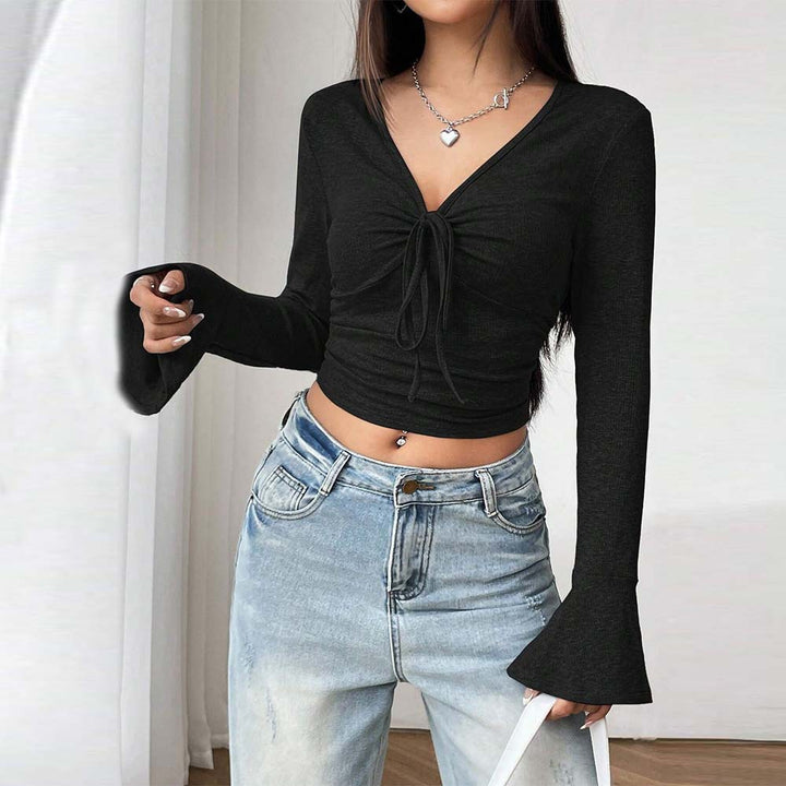 Kvinders langærmet crop top med sofistikeret knude-design Stilla