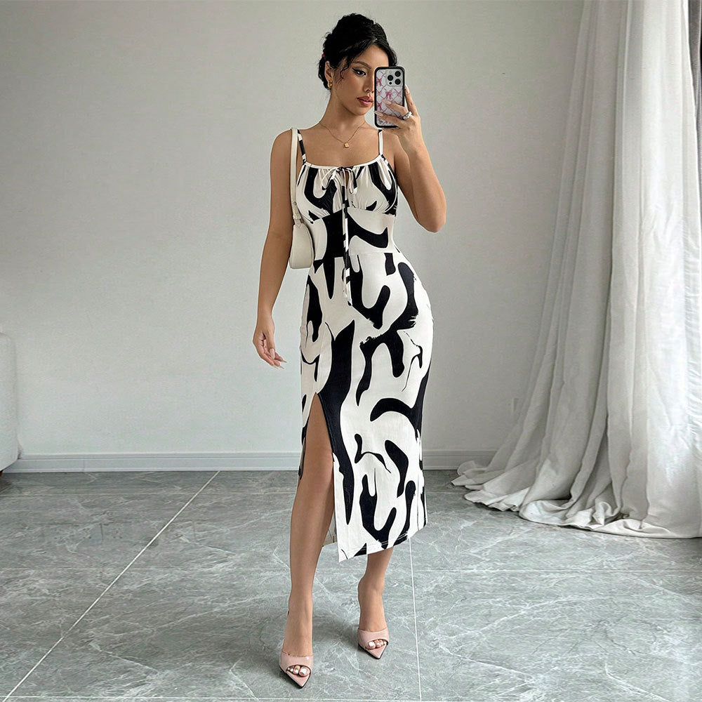 Kvinders maxikjole med elegant drapering design og sideslids Stilla