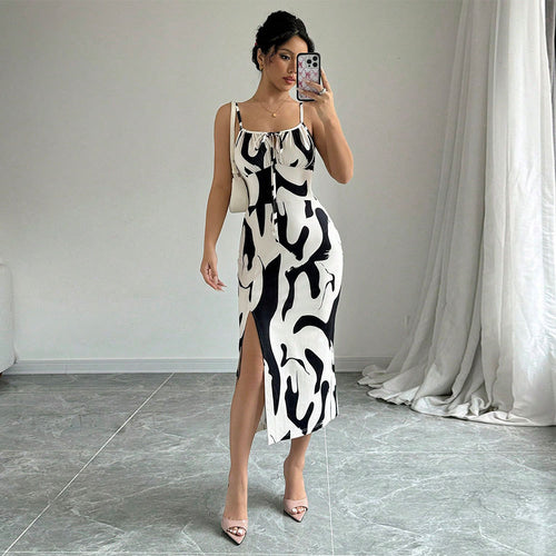 Kvinders maxikjole med elegant drapering design og sideslids Stilla