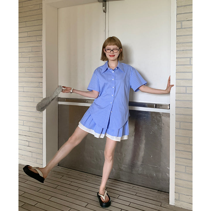 Dame Overshirt med let asymmetrisk snit og dekorative knapdetaljer Stilla