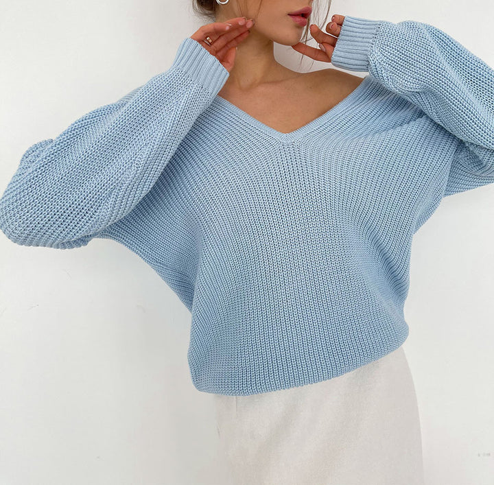 Dame Mode Strikpullover med dyb V-hals og flatterende snit Stilla