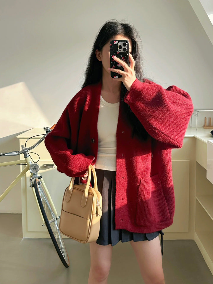 Kvindernes chunky strikket cardigan med elegante knapdetaljer og praktiske lommer Stilla