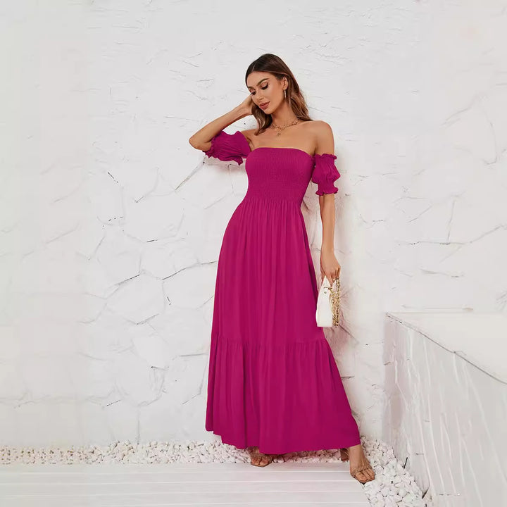 Dame Maxikjole med off-shoulder design og voluminøse flæsedetaljer Stilla