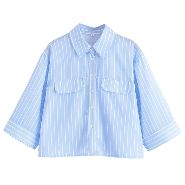 Dame stribet bluse med oversized pasform og praktiske lommer Stilla