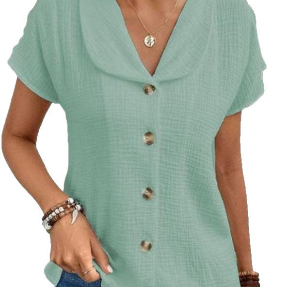 Damebluse med elegant klapkrave og dekorative knapper Stilla