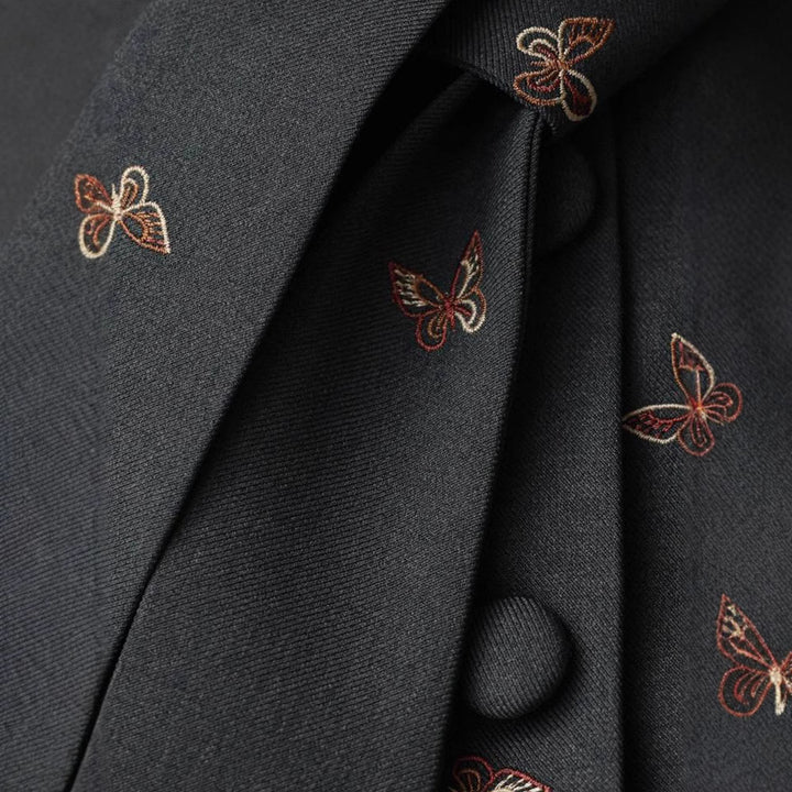 Dame Struktureret Blazer med voluminøse ærmer og skørt Stilla