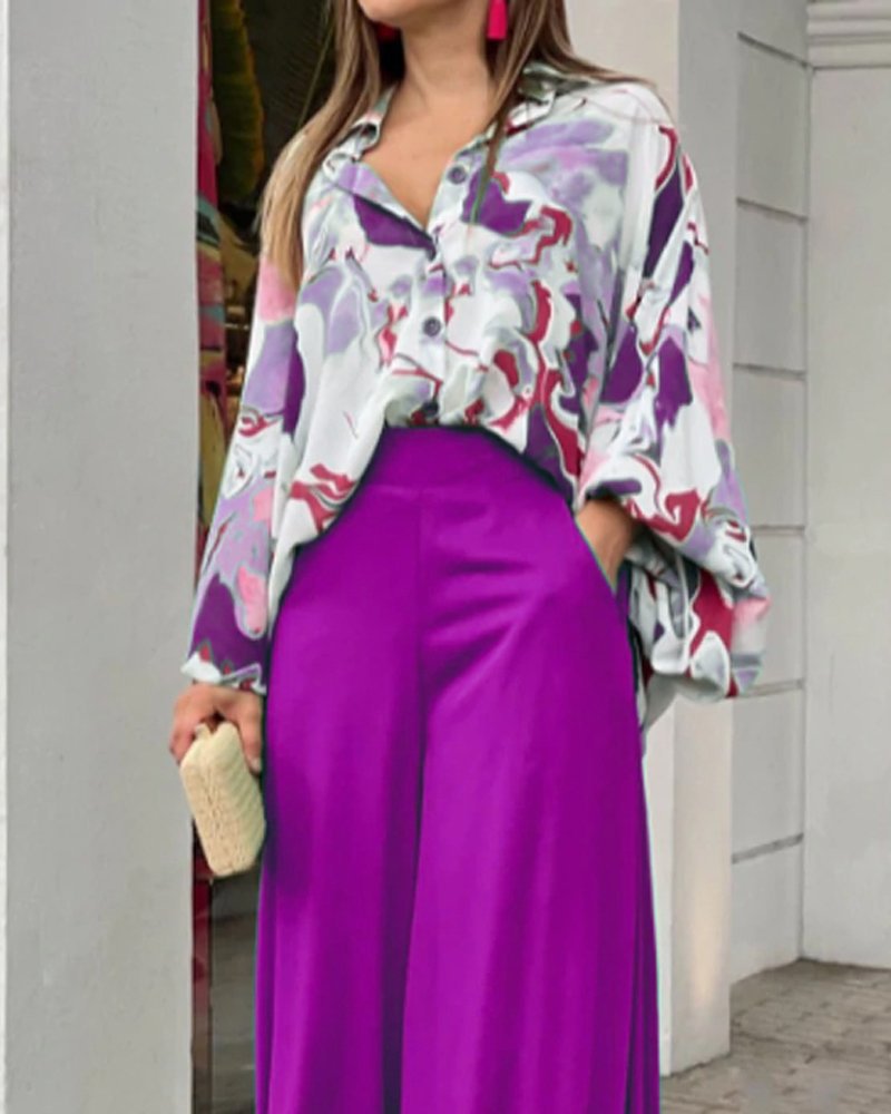 Dame fritidsbluse med farverig marmortryk og loose fit Stilla